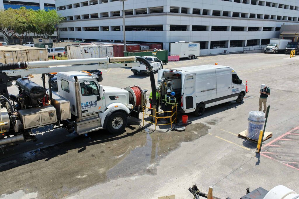 Jet vac cleaning and CCTV pipe inspection in progress, showcasing equipment and technicians ensuring efficient maintenance.